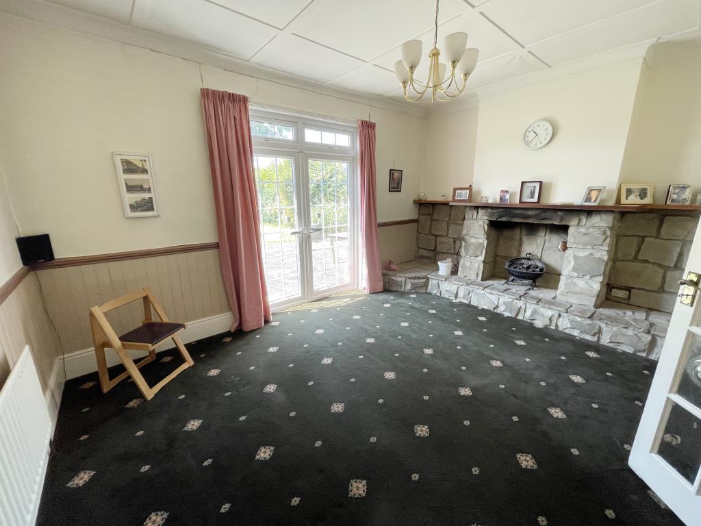 Lot: 84 - DETACHED BUNGALOW & GARAGE WITH POTENTIAL - inside image of dining room/reception two from hallway